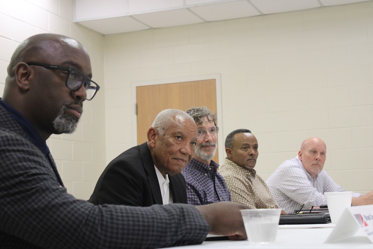 Local pastors participate in a roundtable on community needs and rural resilience in the Delta. Commission Member Charles Cotherman during the panel discussion with local pastors. The Commission at the Leland Medical Clinic, hosted by Delta Health Alliance CEO Karen Matthews, Medical Director Dr. David Weber, and Board Member Lisa Percy, who outlined rural health challenges and their response. Commission member Val Davidson asks a clinic staff member about primary care access and community health efforts in the Delta region.