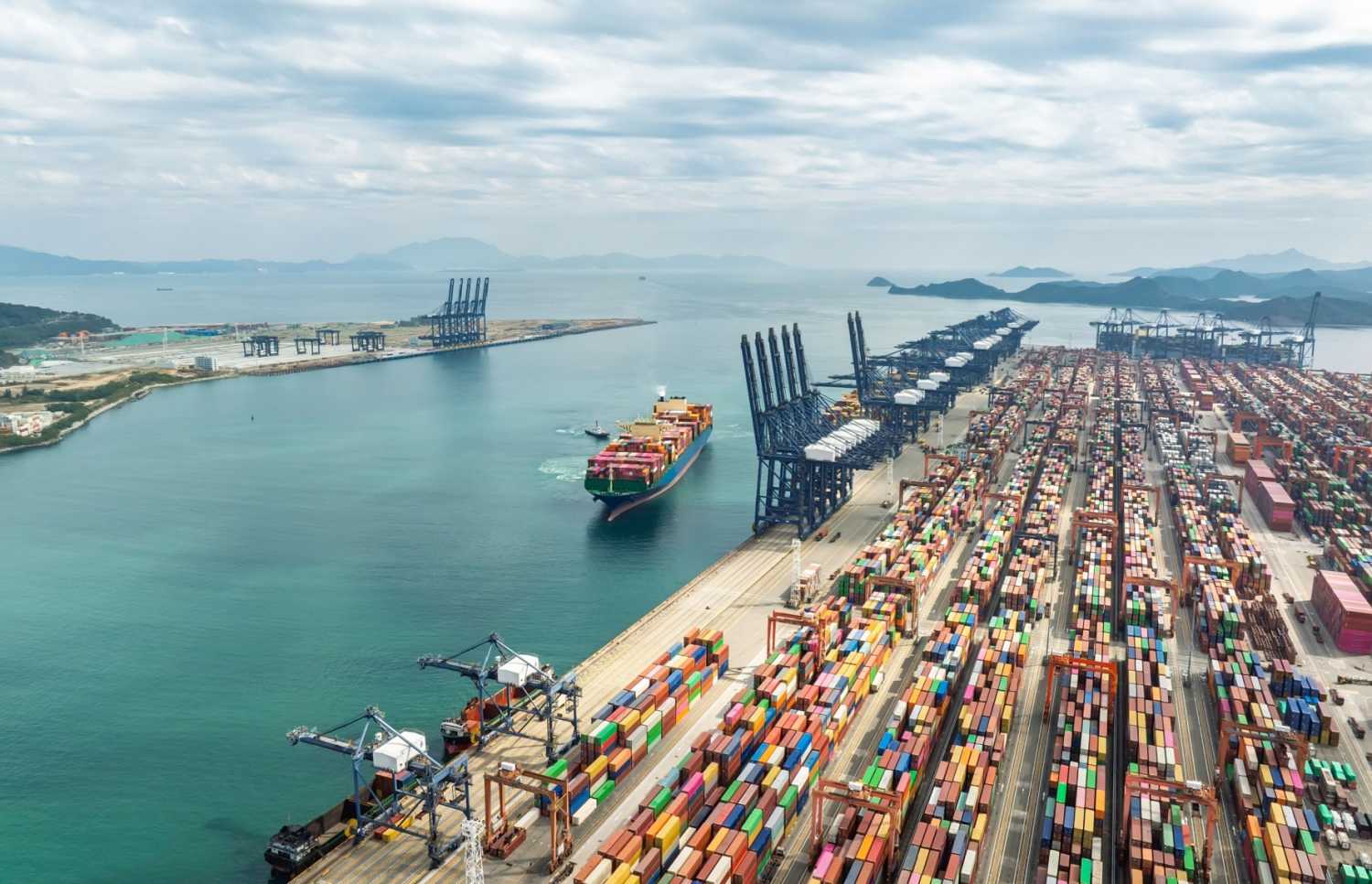 Cargo container ship departs port