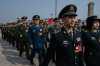 Members of the Chinese Military delegation march into the closing session of the National People's Congress at the Great Hall of the People on March 12, 2026 in Beijing, China