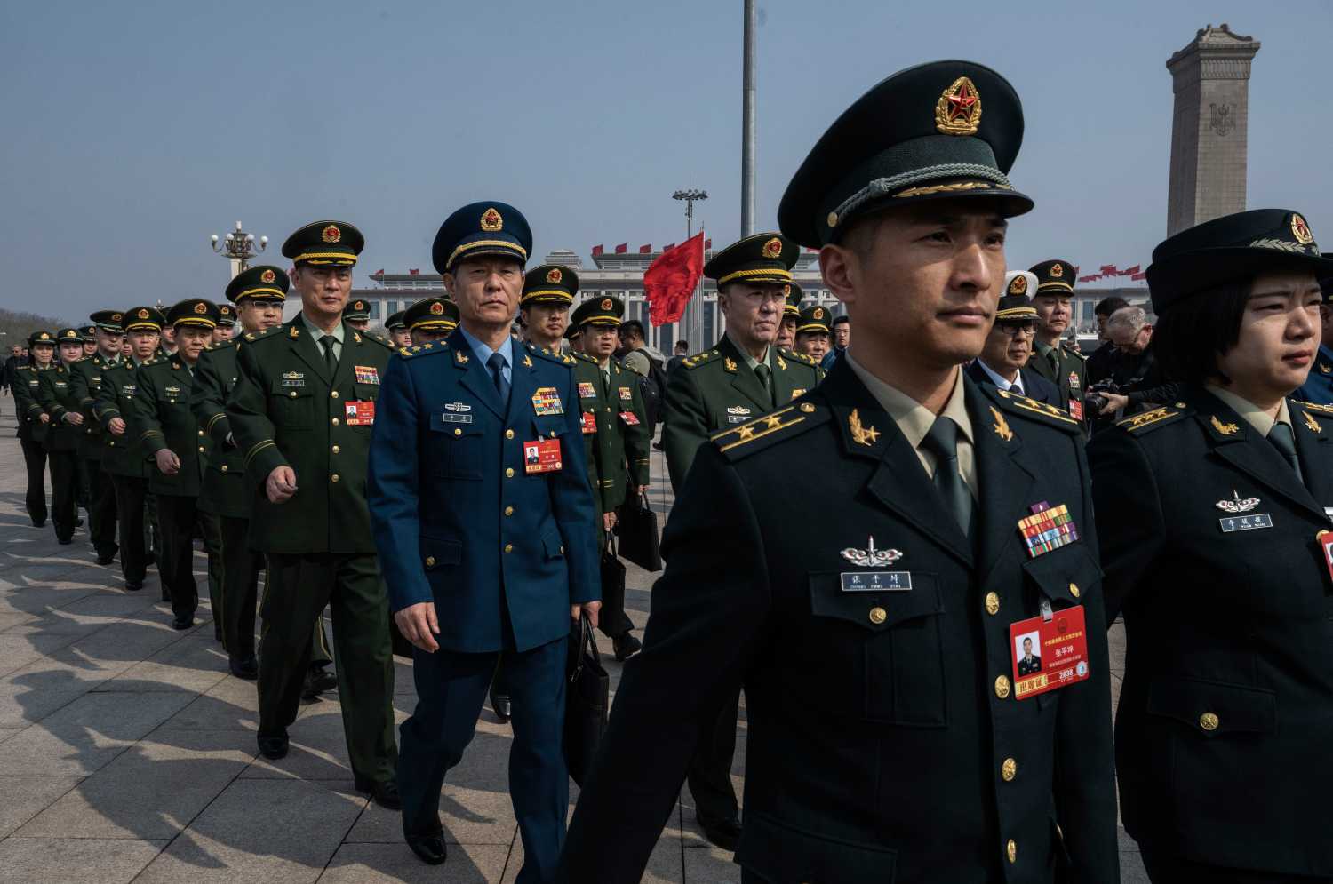 Members of the Chinese Military delegation march into the closing session of the National People's Congress at the Great Hall of the People on March 12, 2026 in Beijing, China