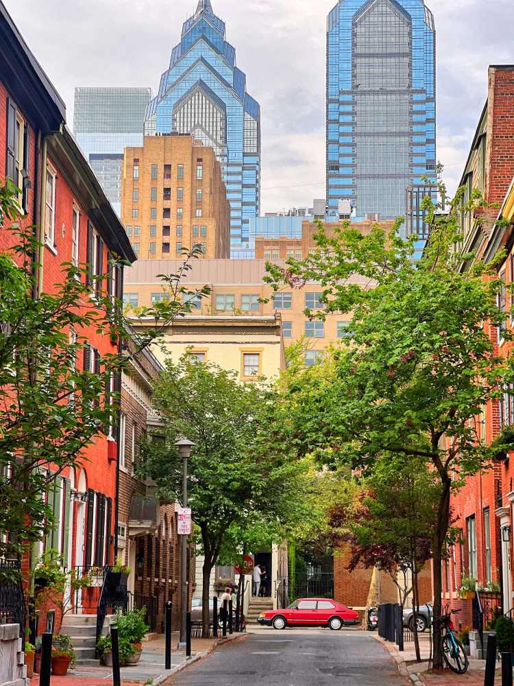 Philadelphia, PA, USA - April 30th, 2024: Street View of S. Medley Street in Rittenhouse Square, Philadelphia with Skyline in the Distance
