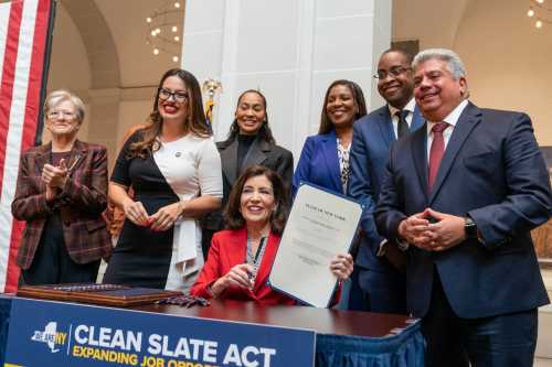 Governor Kathy Hochul signs the Clean Slate Act into the law at Brooklyn Museum in New York on November 16, 2023.