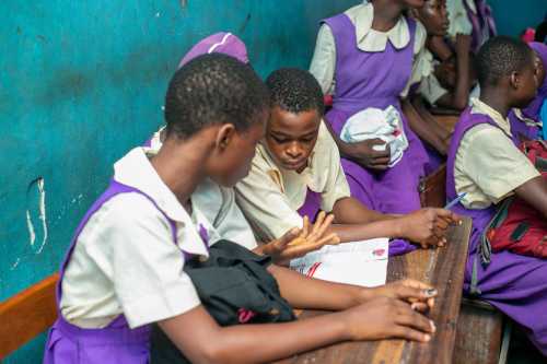Lagos, Nigeria-June 21 2024: Children in the school having conversation with one another