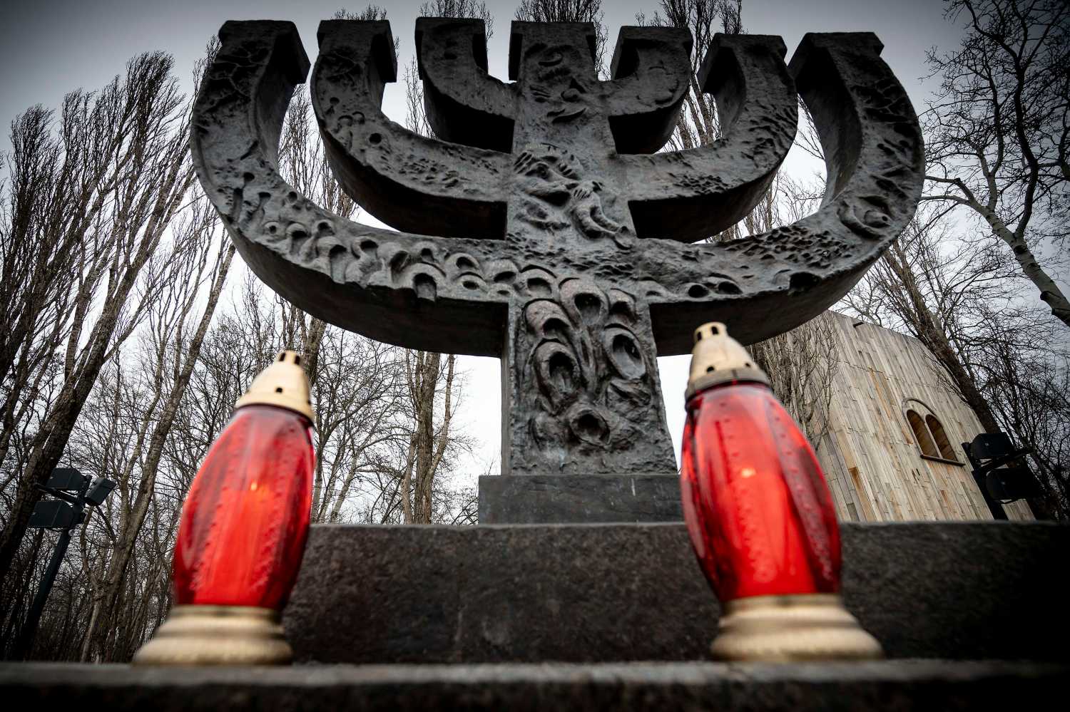 Candles at the Menorah memorial to commemorate International Holocaust Remembrance Day at the Babyn Yar National Historical Memorial site, January 27, 2023 in Kyiv, Ukraine.