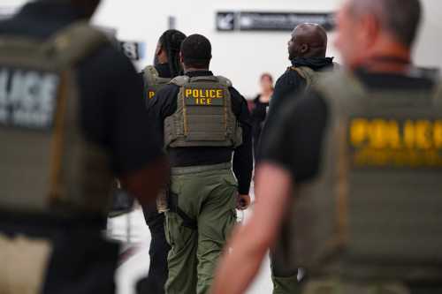 ATLANTA, GEORGIA - MARCH 25: A group of ICE agents walk around Atlanta Hartsfield-Jackson International Airport on March 25, 2026 in Atlanta, Georgia.
