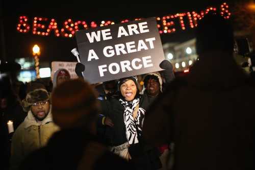 Demonstrators protest the shooting death of Michael Brown near the police station on Nov. 21, 2014 in Ferguson, Missouri. Brown, an 18-year-old black man, was killed by Darren Wilson, a white Ferguson police officer, on August 9.