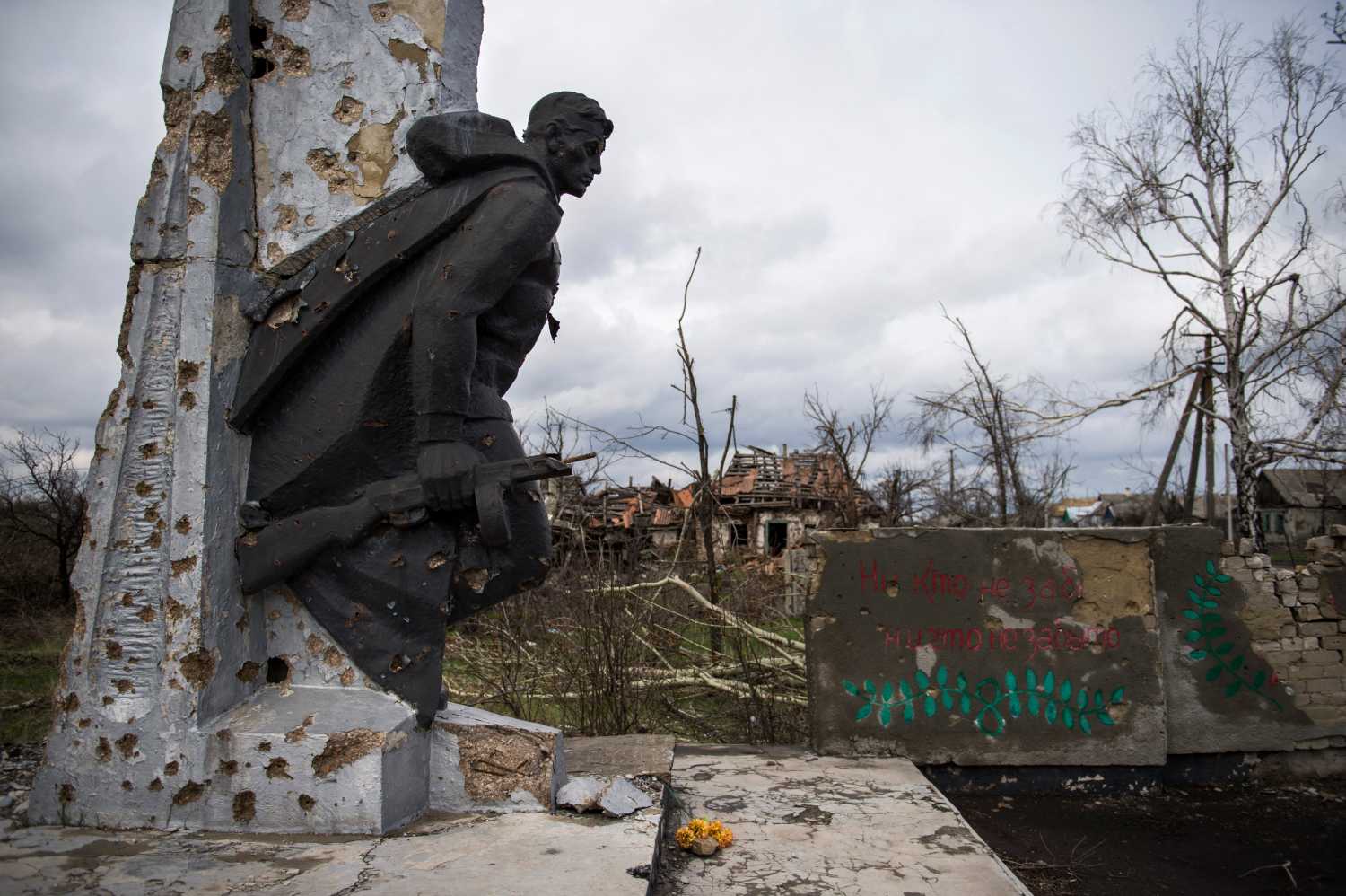 A war damaged WWII memorial is seen in the village of Nikishino on April 21, 2015 in the self-proclaimed Donetsk People's Republic (DNR).