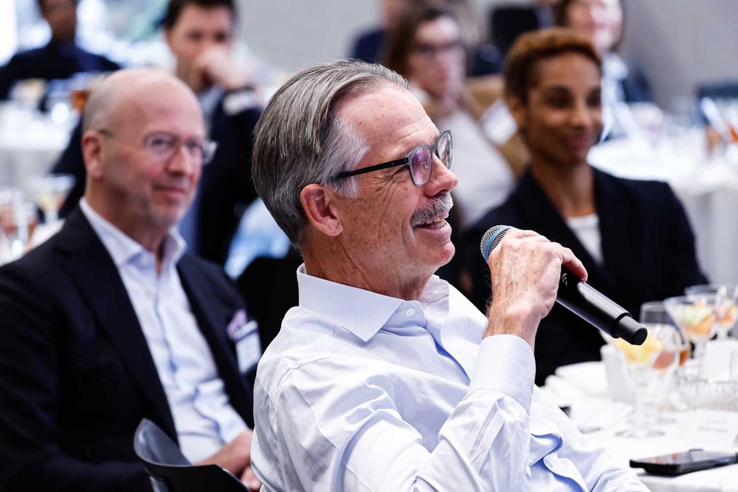 Board of Trustees Co-Chair Glenn Hutchins asks a question at a Brookings event.