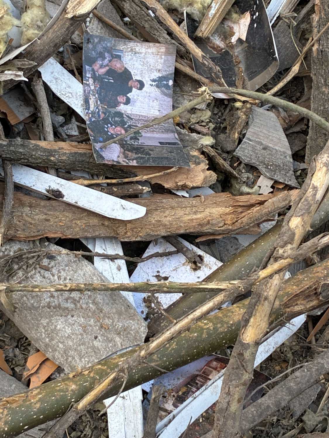 What appears to be a family photo can be spotted amidst the rubble of a building hit by a Russian missile attack in Dnipro, Ukraine.