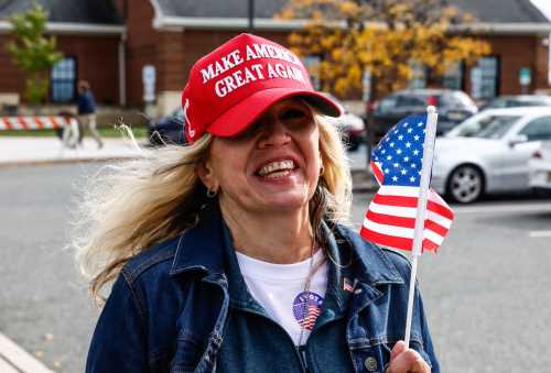 voter wearing a "Make America Great Again" hat is seen during early voting on October 31, 2025 in Bridgewater, New Jersey. Republican candidate and assembly member Jack Ciattarelli will face off against Democrat Rep. Mikie Sherrill (D-N.J.) in a tightly contested race for New Jersey governor on November 4.