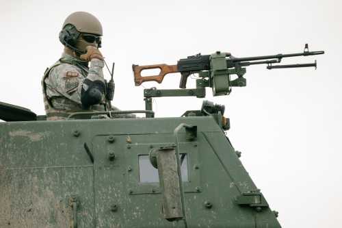 CINCU, ROMANIA - FEBRUARY 9: A NATO soldier uses a communication system on top of a High Mobility Artillery Rocket System (HIMARS) launcher on Feb. 9, 2026, in Cincu, Romania. Dynamic Front 26 is the largest U.S. Army-led artillery exercise ever held in Europe. It brings together NATO allies to practice the Eastern Flank Deterrence Line strategy, focusing on high-tech coordination across land, air, sea, and cyber domains. The exercise will test how quickly troops can make decisions and strike targets across national borders, by using live-fire drills at sites like Romania's Cincu Training Area. The exercise is running from Jan. 26 until Feb. 13, 2026.