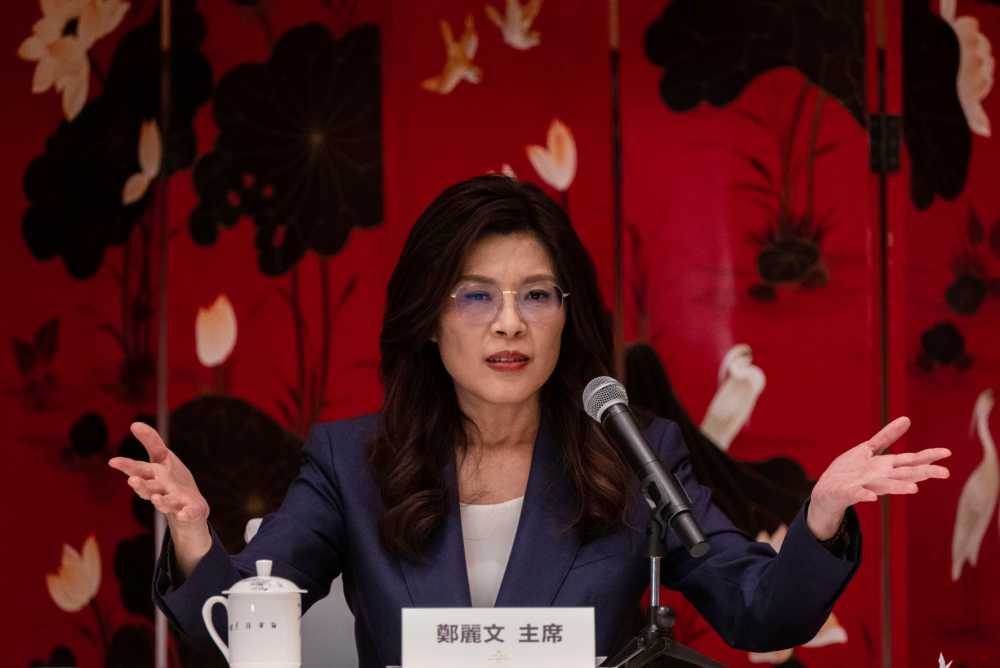 Taiwan opposition party leader Cheng Li-wun of the Kuomintang (KMT) gestures as she speaks at a press conference on April 10, 2026 in Beijing, China.