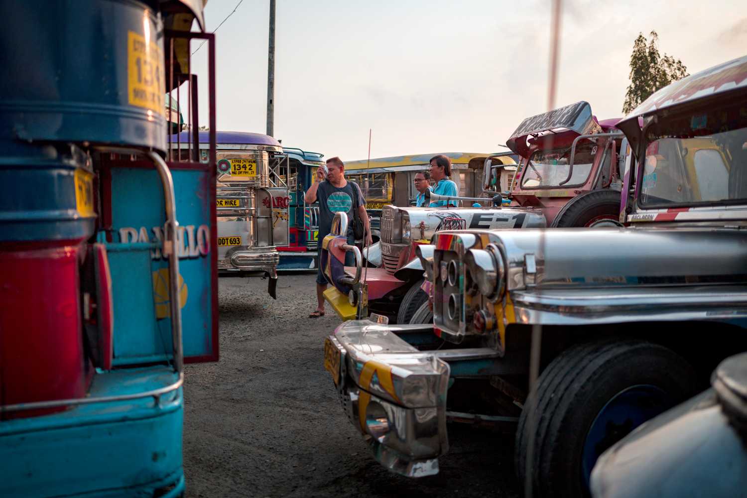 Jeepney drivers wait for passengers at a jeepney yard on April 19, 2026 in Muntinlupa, Metro Manila, Philippines.