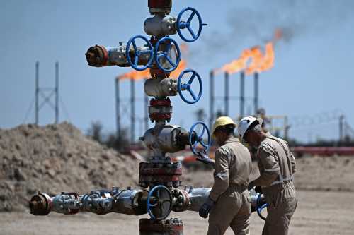 Employees of Basra Oil Company, work at the Nahr Bin Umar Oil and Gas Field on the outskirts of the southern Iraqi city of Basra on April 29, 2026.