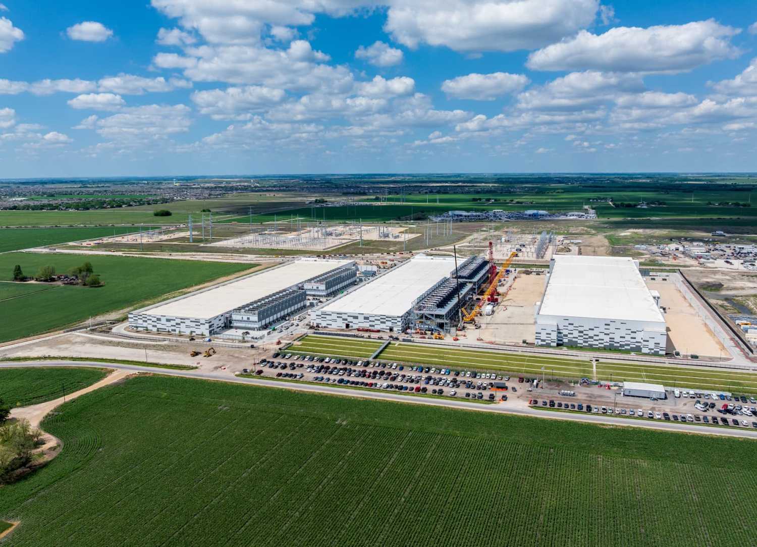 An aerial view shows construction of a massive Skybox AI data center campus in Hutto, Texas, on April 18, 2026, which will host 400 million square feet of space with 600 megawatts of capacity.