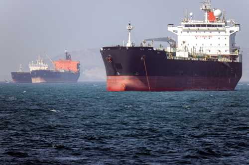 In this picture obtained from Iran's ISNA news agency and taken on May 2, 2026, the Gambia-flagged tanker vessel Bili is pictured anchored in the Strait of Hormuz off Bandar Abbas in southern Iran.