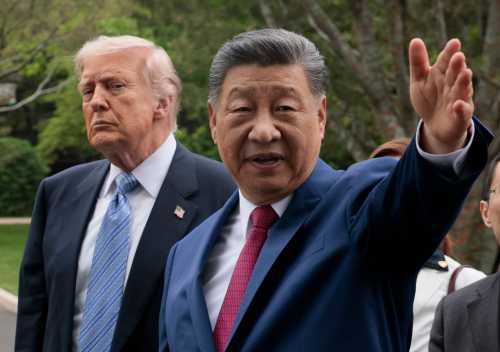 BEIJING, CHINA - MAY 15: U.S. President Donald Trump and Chinese President Xi Jinping tour Zhongnanhai Garden on May 15, 2026 in Beijing, China. Trump and other U.S. officials are finishing up a visit intended to address the Iran conflict, trade imbalances, and the Taiwan situation while establishing new bilateral boards for economic and AI oversight.