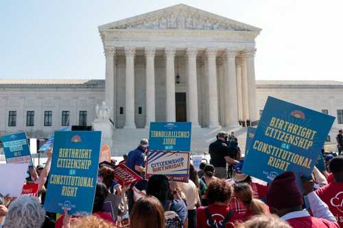 Demonstrators rally in support of birthright citizenship outside the U.S. Supreme Court as President Donald Trump attends oral arguments in Washington, D.C., on April 1, 2026.