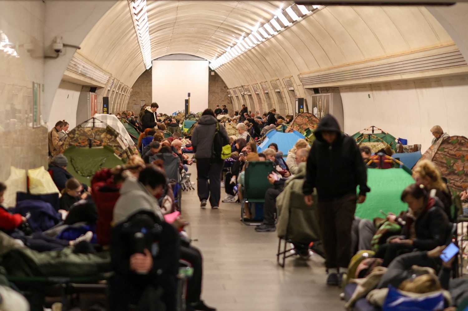 People shelter in a metro station during a Russian missile strike on the Ukrainian capital Kyiv on June 15, 2026, amid the Russian invasion in Ukraine.
