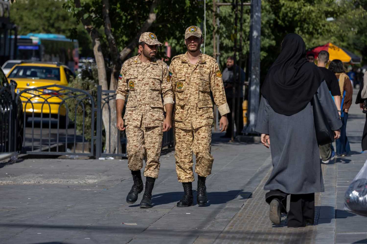 TEHRAN, IRAN - JUNE 15: Military soldiers are seen walking on a street in Tehran on June 15, 2026 in Tehran, Iran.