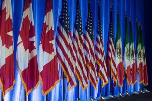 Flags of Canada, the United States, and Mexico