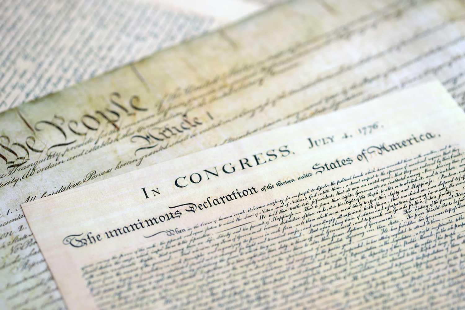 A close-up of a replica of the Declaration of Independence