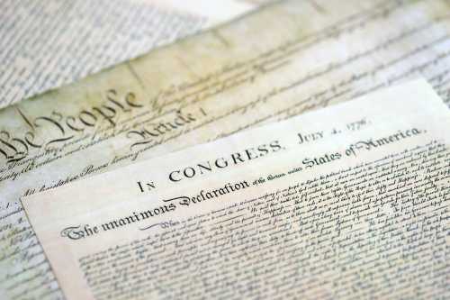 A close-up of a replica of the Declaration of Independence