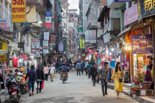 A busy afternoon at a street in the tourist district of Thamel in Kathmandu.
