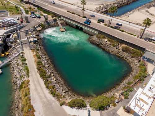This high-resolution aerial photograph documents the pre-treatment phase at the Claude "Bud" Lewis Carlsbad Desalination Plant.