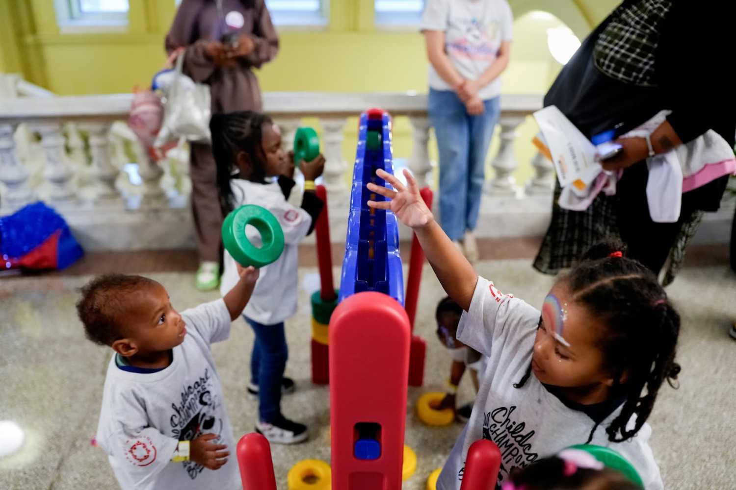 WASHINGTON, DC - MAY 13: Children from Washington, D.C., area child care programs play games during the take over of the Wilson Building for the Annual Day Without Daycare event by SPACEs In Action at the Wilson Building on May 13, 2026 in Washington, D.C.