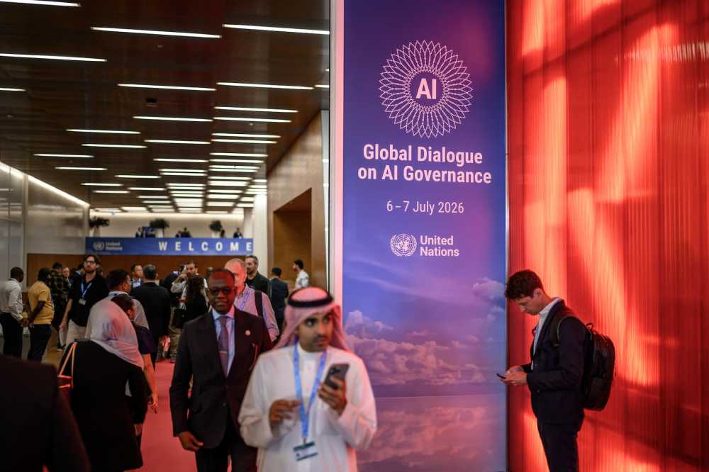 Participants take part in the opening day of the first Global Dialogue on AI Governance, in Geneva on July 6, 2026. UN Secretary-General called for a global governance system to shape artificial intelligence for the good of humanity, warning against allowing the technology itself to "vibe-code" our future.