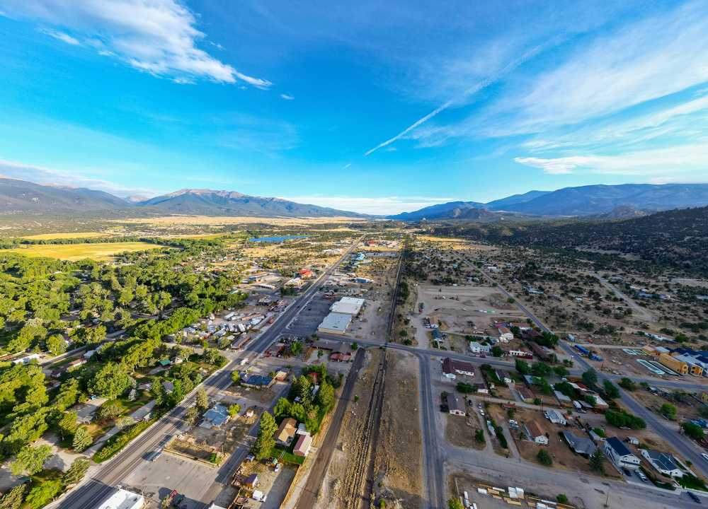 Residential and industrial development along the railroad tracks in Buena Vista, Colorado, home to a designated Opportunity Zone.
