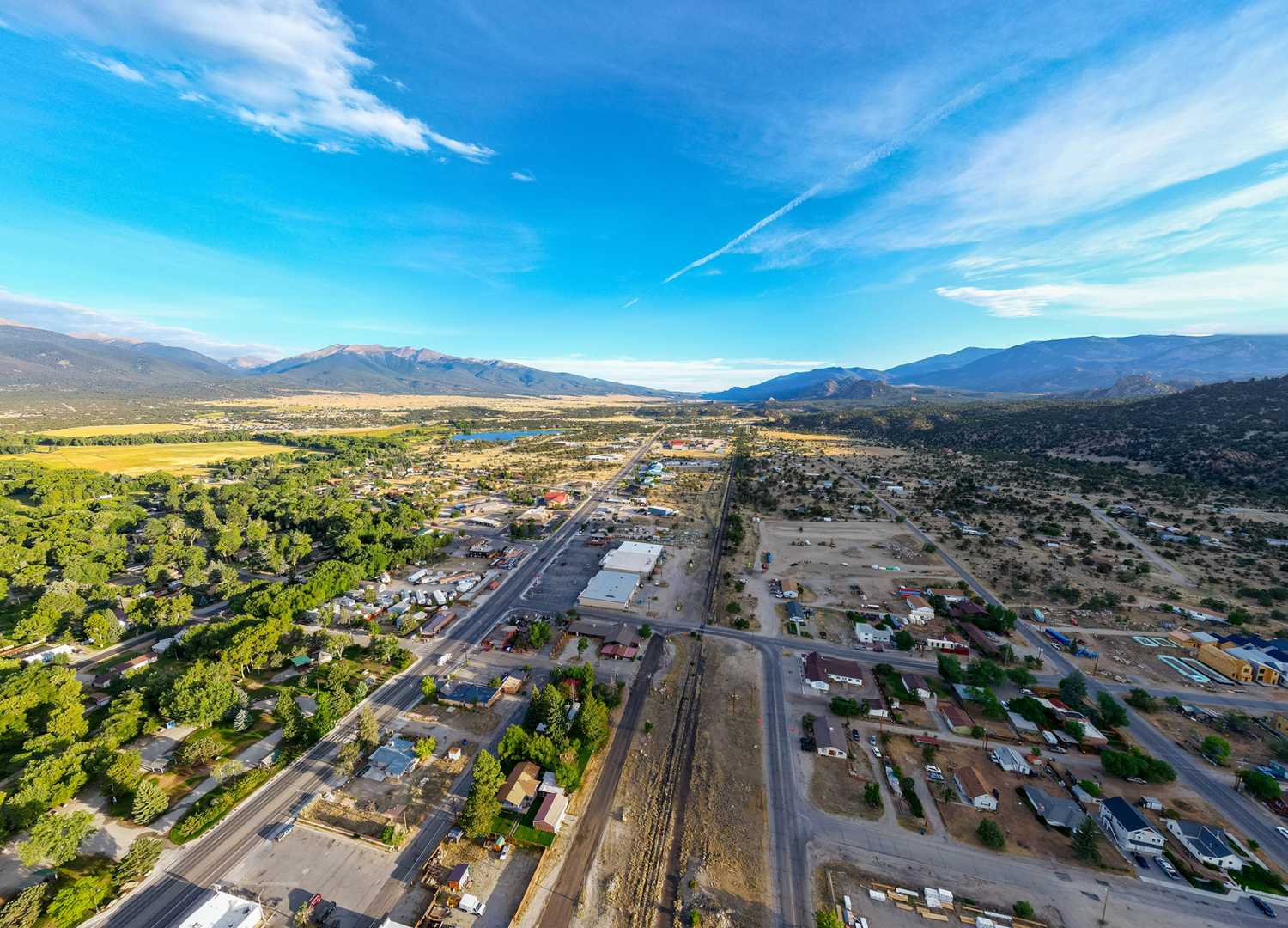 Residential and industrial development along the railroad tracks in Buena Vista, Colorado, home to a designated Opportunity Zone.