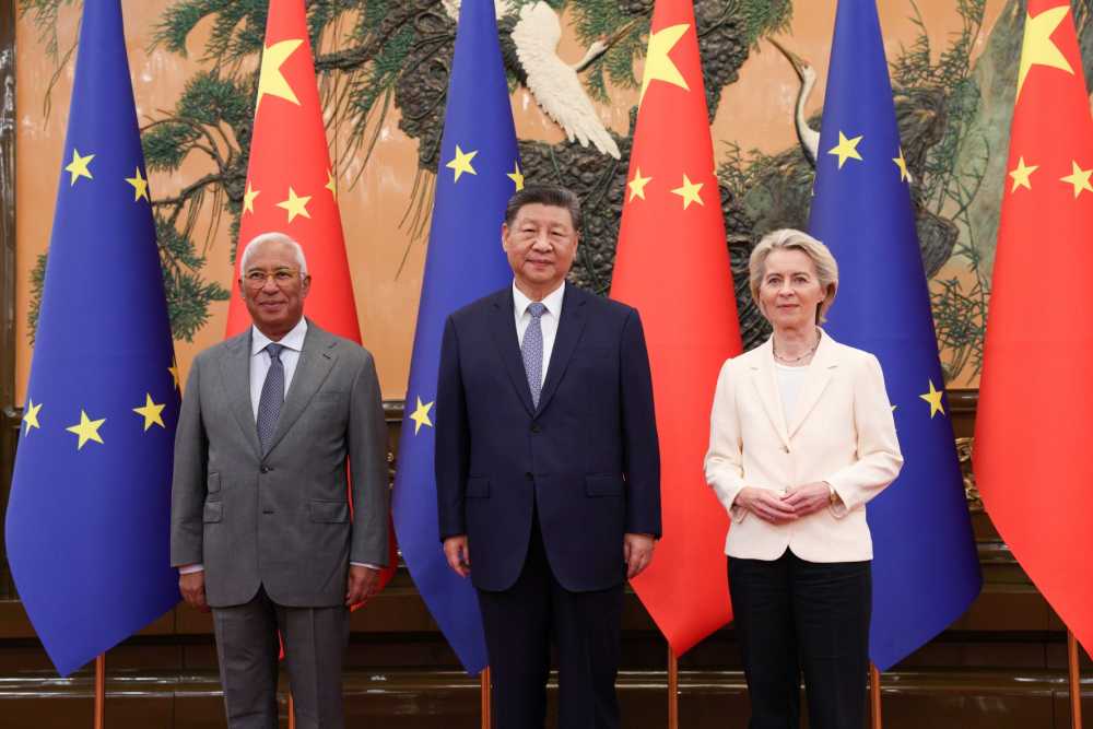 From left to right, Antonio Costa, President of the European Council, Xi Jinping, President of the People Republic of China, and Ursula Von der Leyen, President of the European Commission, stand in front of the national flags of China and the European Union during the 25th EU China summit in Beijing, Beijing Municipality, China on July 24, 2025.