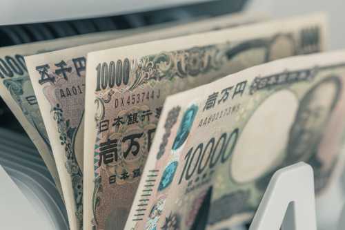 Close up of Japanese yen converted by machine.