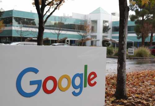 MOUNTAIN VIEW, CALIFORNIA - DECEMBER 19: A sign is posted in front of an office at Google headquarters on Dec. 19, 2023, in Mountain View, California.