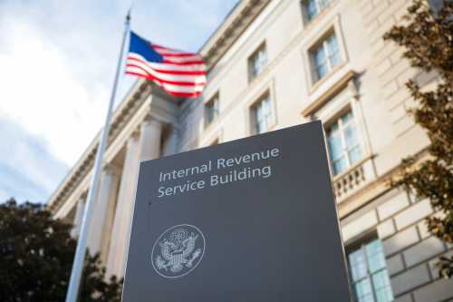 WASHINGTON, DC - FEBRUARY 13: A sign for the Internal Revenue Service (IRS) is seen outside its building on Feb. 13, 2025, in Washington, D.C.