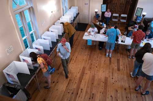 MADISON, WISCONSIN - AUGUST 11: Residents vote in the state's primary election on Aug. 11, 2026, in Madison, Wisconsin. The Wisconsin primary is being watched closely nationwide by both major political parties to see which direction voters are steering the parties before the November midterm elections.
