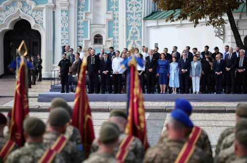 (From L) Ukraine's Defense Minister Denys Shmyhal (Top L), Britain's Prime Minister Andy Burnham (4th L), Finland's President Alexander Stubb (C), Lithuania's President Gitanas Nauseda (4thR), Ukraine's Defence Minister Rustem Umerov (4thR Rear) and Estonia's President Alar Karis (R) attend a commemorative ceremony marking Ukraine's 35th Independence Day outside St. Sofia cathedral in Kyiv on August 24, 2026.