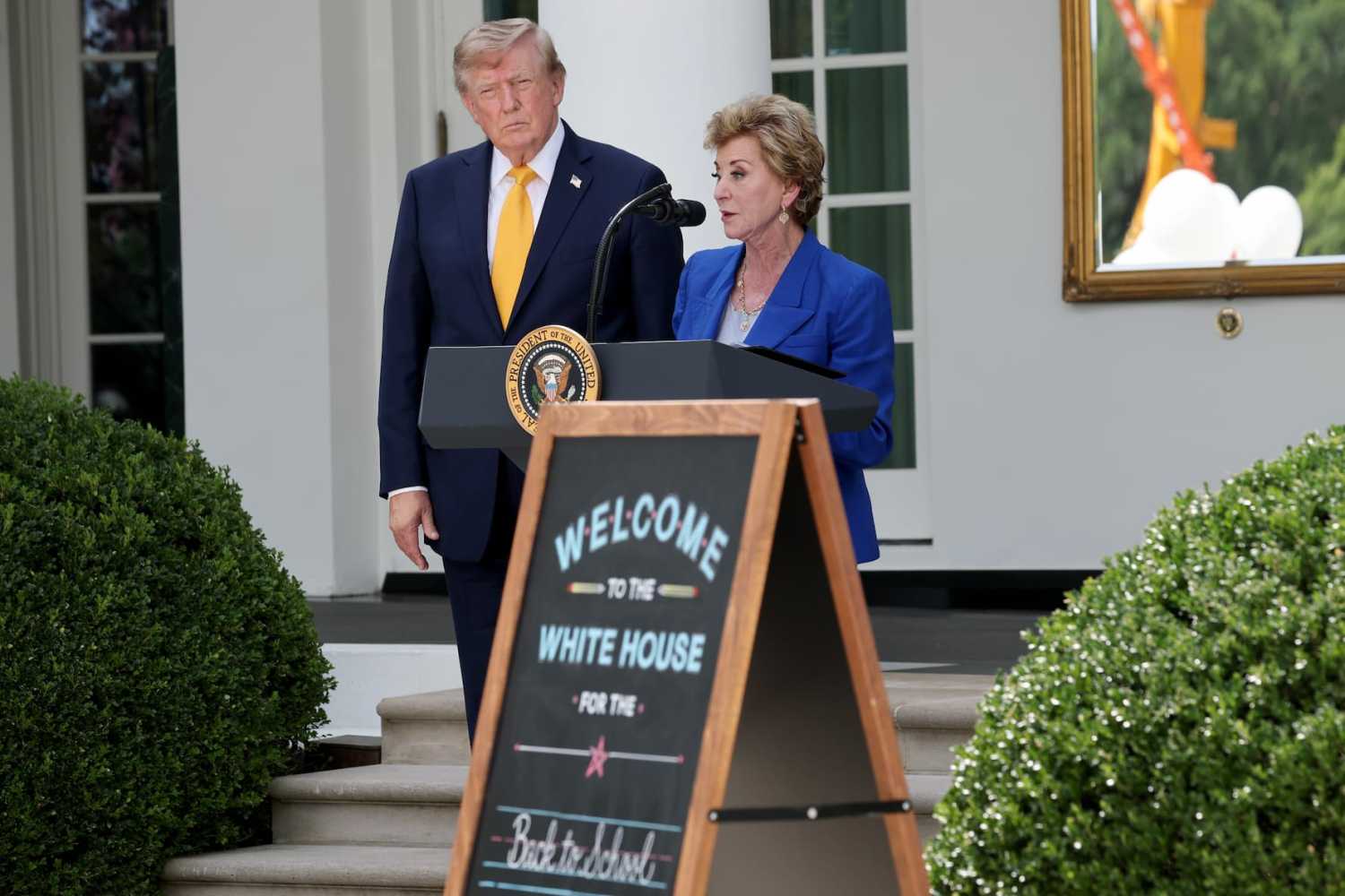 WASHINGTON, DC - AUGUST 24: U.S. President Donald Trump and Secretary of Education Linda McMahon during an event in the Rose Garden of the White House on Aug. 24, 2026, in Washington, D.C.