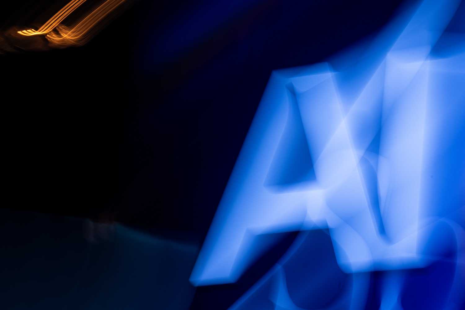 An AI symbol is seen during day two of the "ALL IN 2026" conference at the Palais des Congres de Montreal in Montreal, Quebec, Canada, on September 17, 2026. "All In" is Canada's largest artificial intelligence and technology event. (Photo by ANDREJ IVANOV / AFP via Getty Images)
