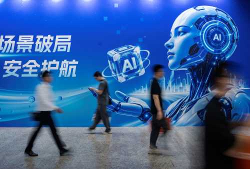 Visitors walk by a billboard for AI as they attend the PT Expo on September 22, 2026 in Beijing, China.