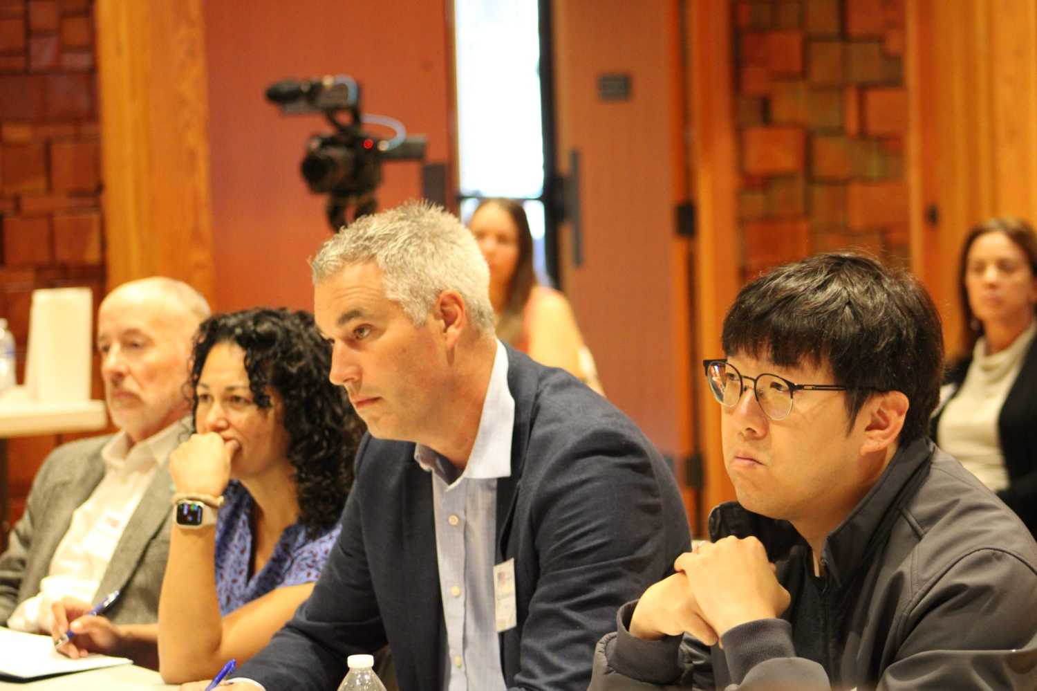 Commission members listen during the field hearing. From left: Keith Humphreys, Xochitl Torres Small, Charlie Cotherman, and Phil Chow.