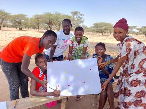 Karamoja girls show school map