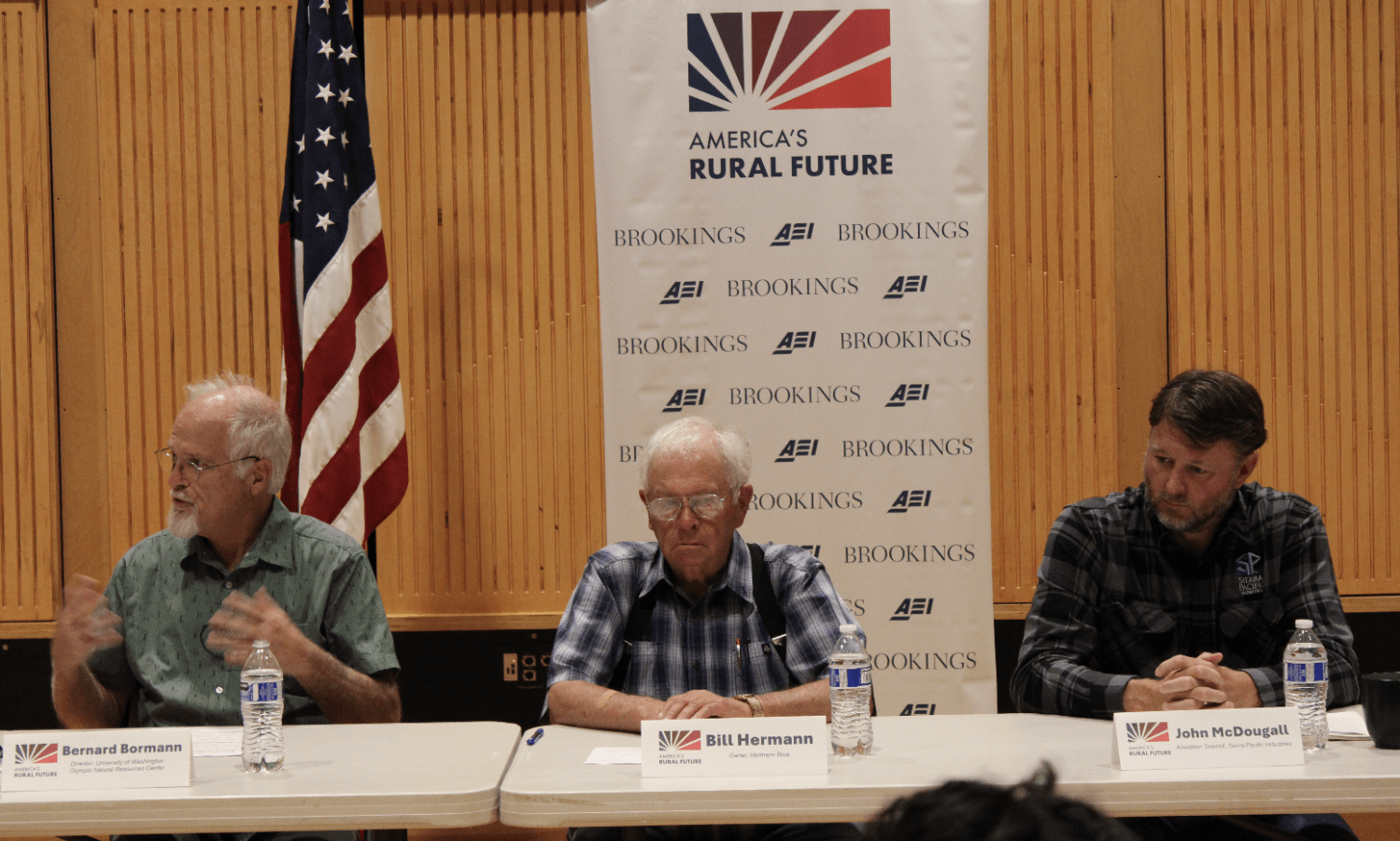 Timber panelists on forest management and the rural economy. From left: Bernard Bormann (UW Olympic Natural Resources Center), Bill Hermann (Hermann Bros.), and John McDougall (Sierra Pacific Industries).