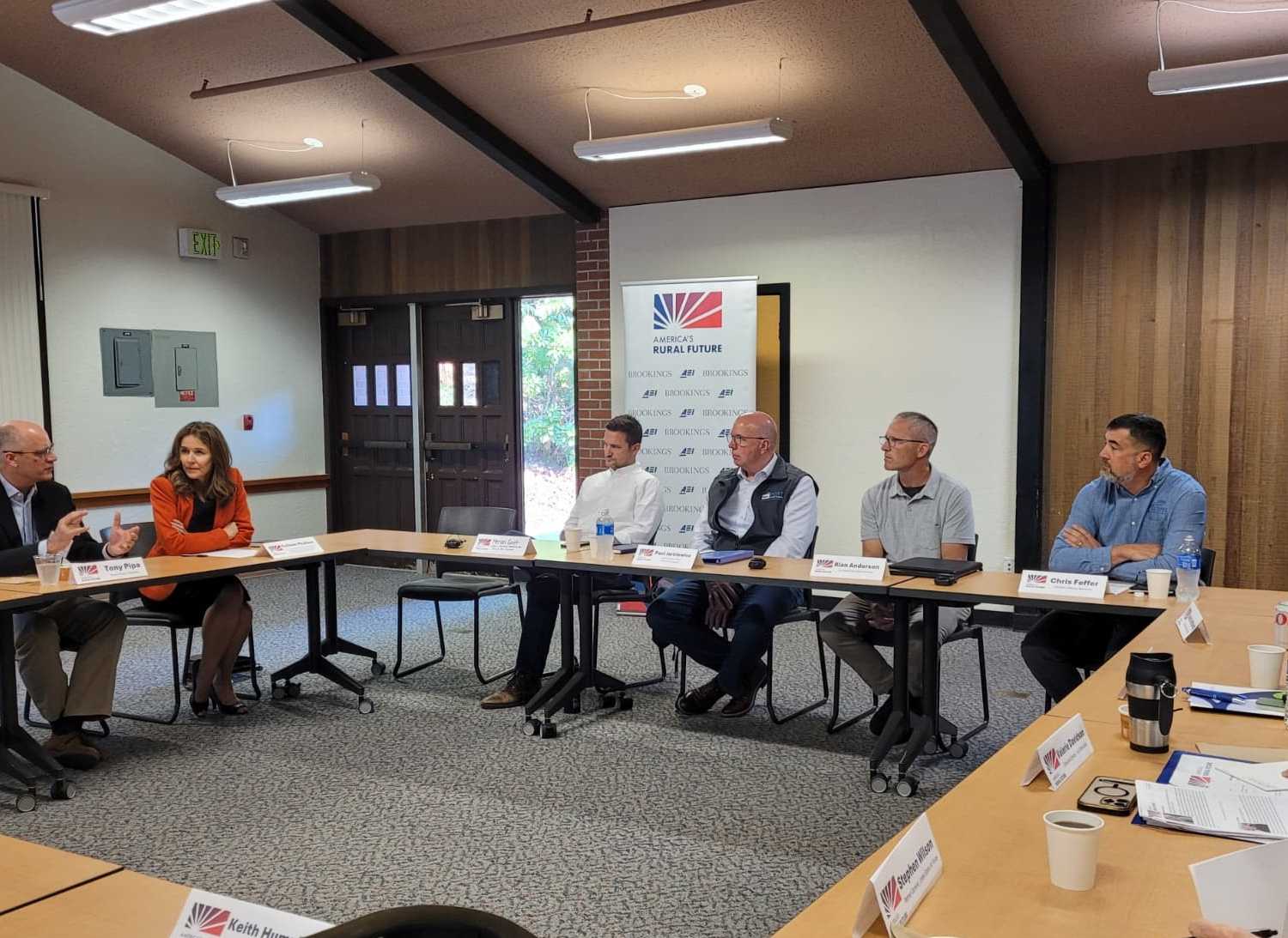 Maritime economy session, with panelists including Eric Toews (Port of Port Townsend), Paul Jarkiewicz (Port of Port Angeles), Rian Anderson (Black Ball Ferry Line), and Christopher Feffer (Platypus Marine).