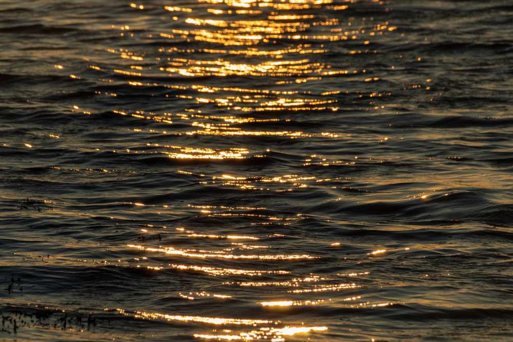 Sunset on the surface of water