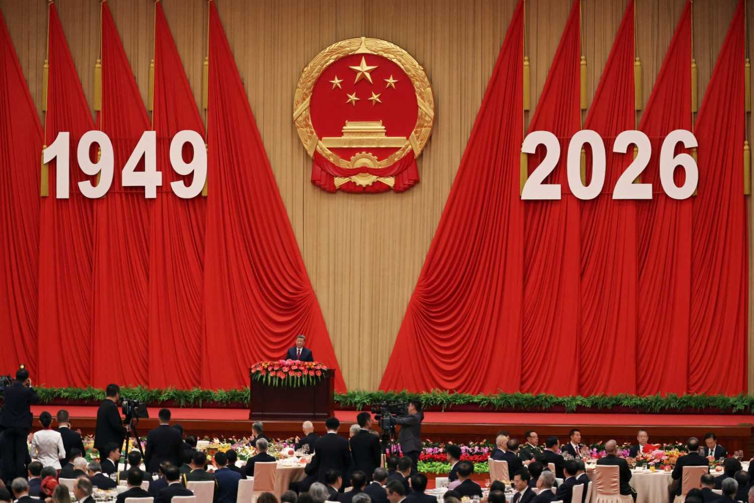 Attendants listen to Chinese President Xi Jinping's speech at the National Day reception on the eve of the 77th founding anniversary of the People's Republic of China, at the Great Hall of the People in Beijing, China September 30, 2026.