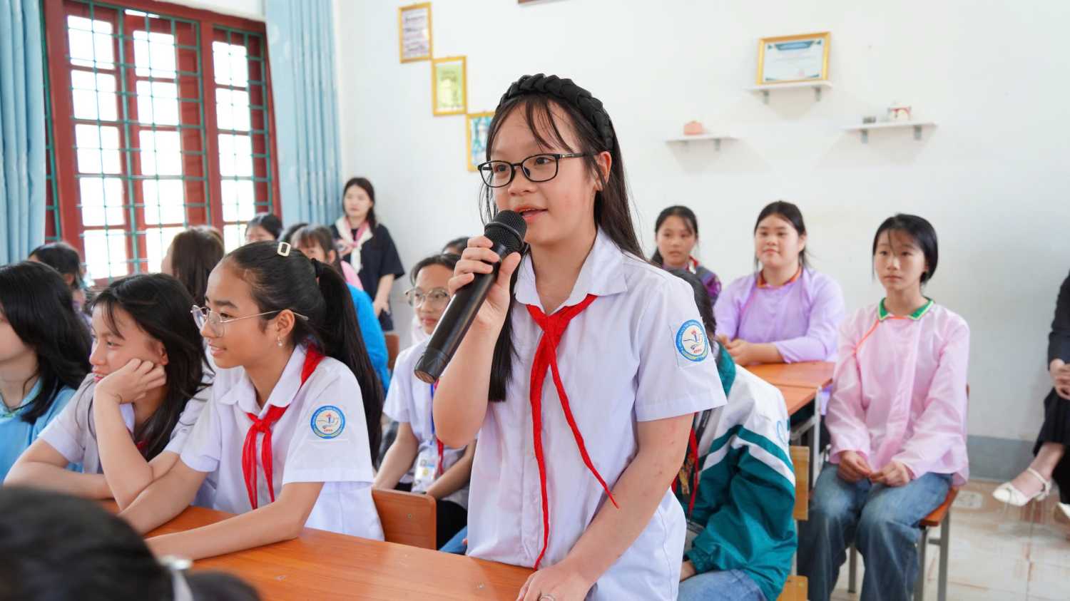girl speaking at a workshop