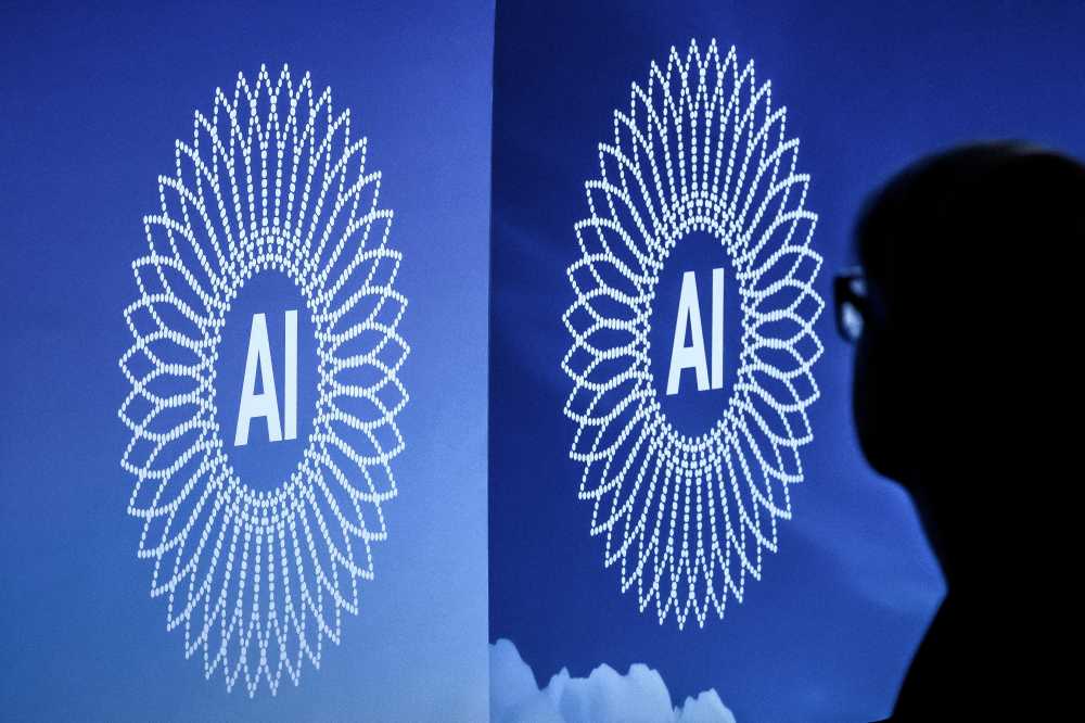 A person is silhouetted next to the logo of the first Global Dialogue on AI Governance, in Geneva on July 6, 2026. Guterres called for a global governance system to shape artificial intelligence for the good of humanity, warning against allowing the technology itself to "vibe-code" our future.  (Photo by Fabrice COFFRINI / AFP via Getty Images)